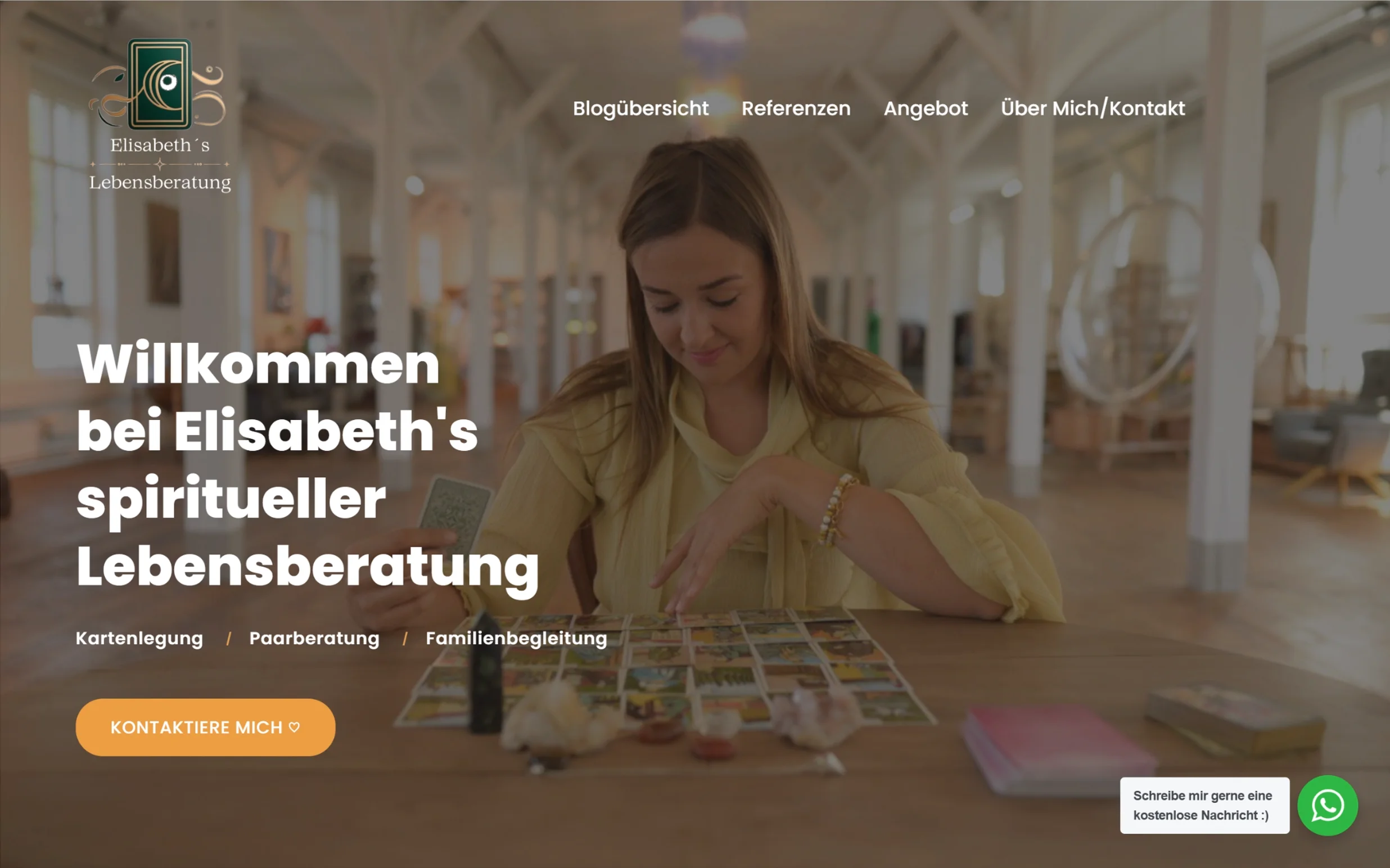 Elisabeths Lebensberatung website shown on a MacBook Air